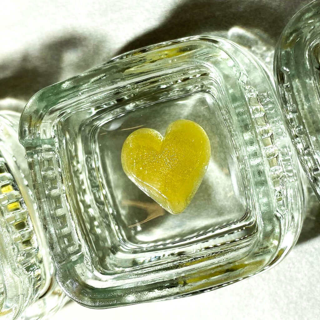 A heart shaped yellow cannabis substance