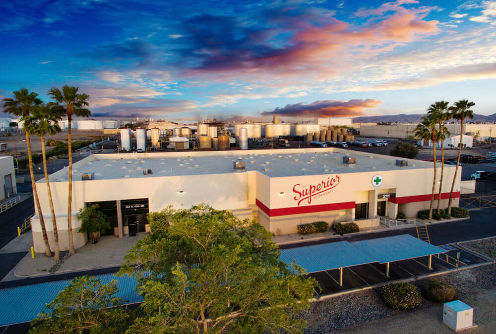 Birds eye view of superior dispensary with sunset in the background